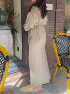 Radomira – Elegant Tie-Blouse & Flow Skirt Set